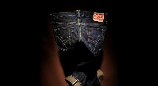 Japanese selvedge denim jeans by The Strike Gold, dark indigo back view with signature pocket stitching.